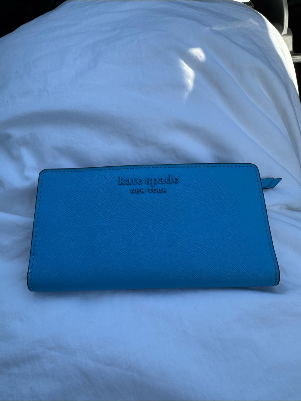 kate spade blue zip-around wallet